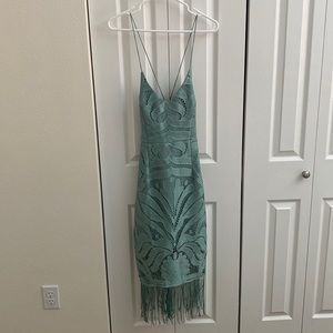 Lady Black tie dress in size 4. Color is sage